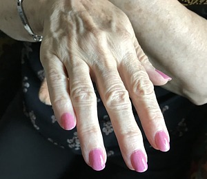 Kimberly's pink fingernails.